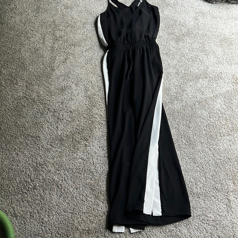 Jumpsuit with stripes on side.